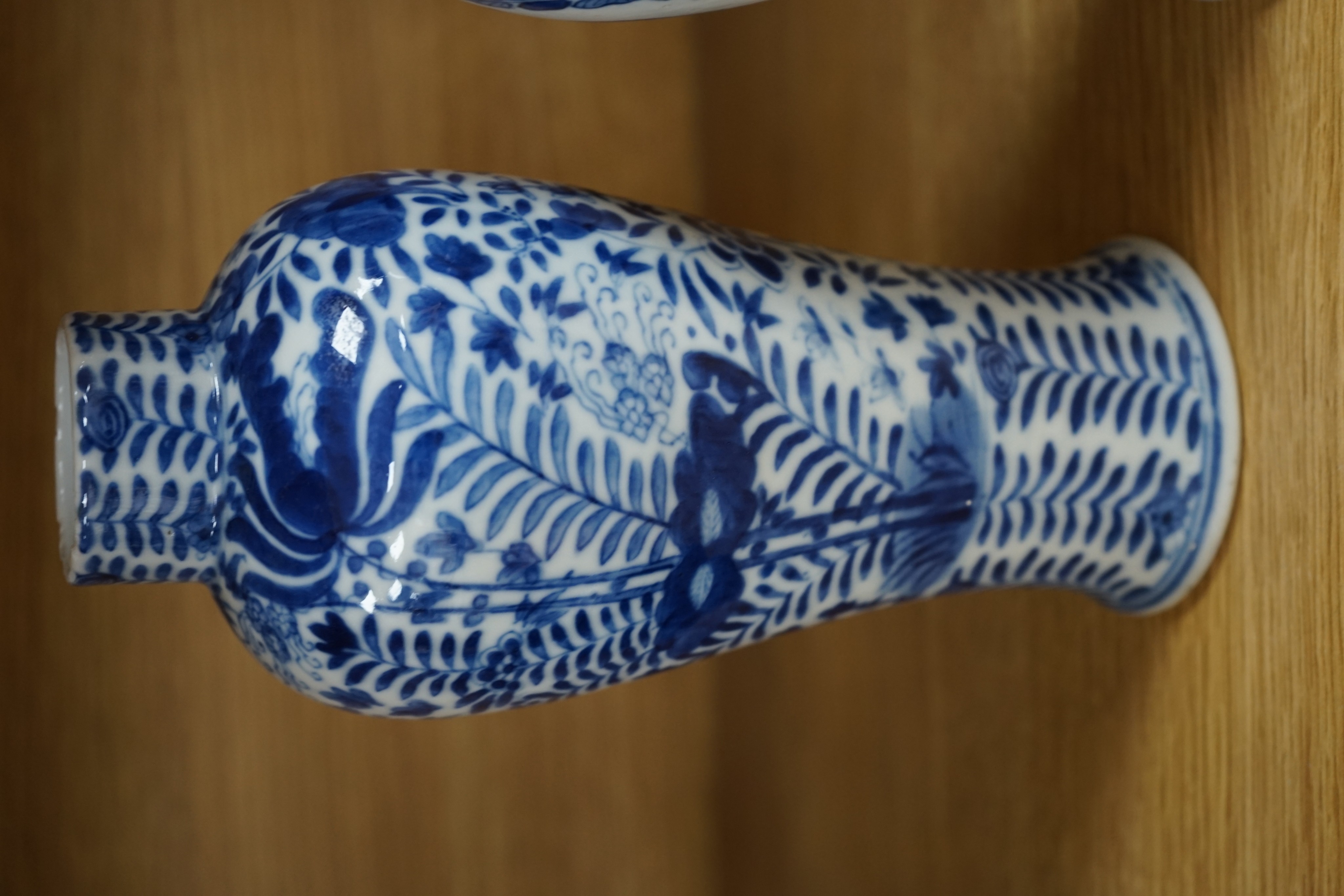 Two Chinese blue and white baluster vases, late 19th century and a Chinese sang de boeuf glazed vase, 27cm